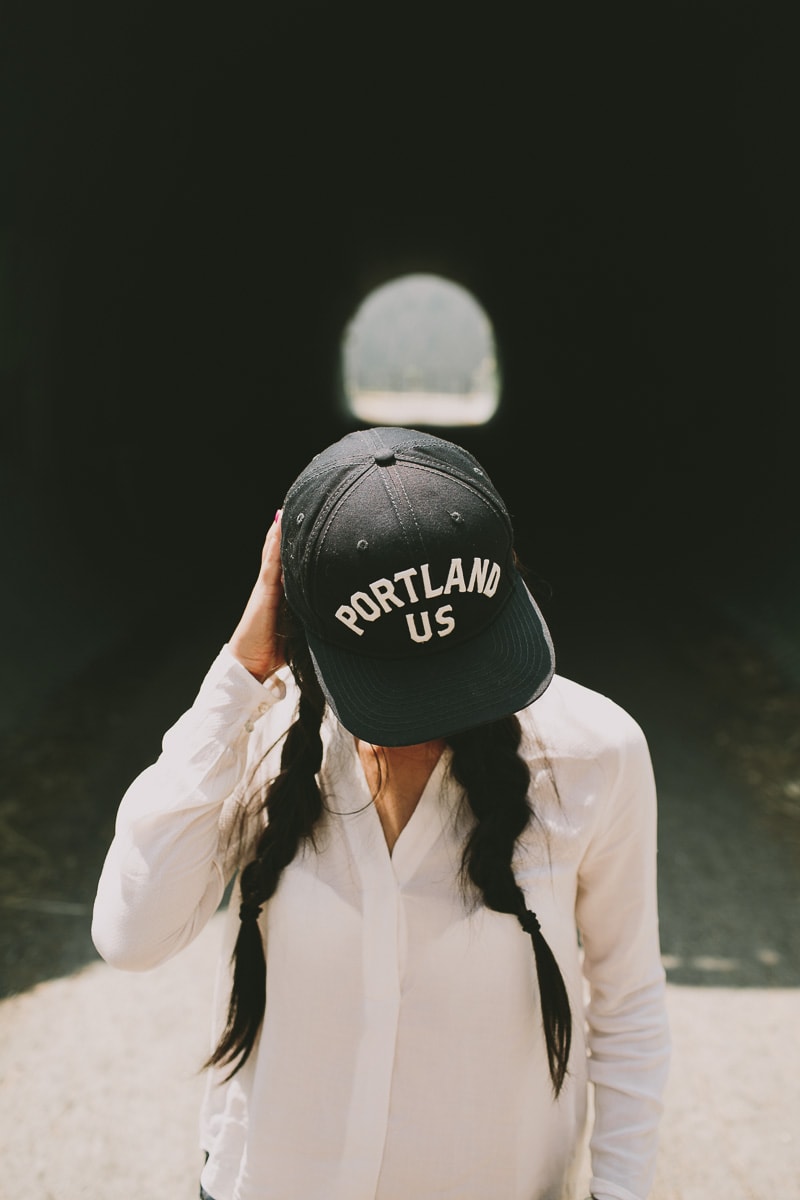 girl wearing Portland hat