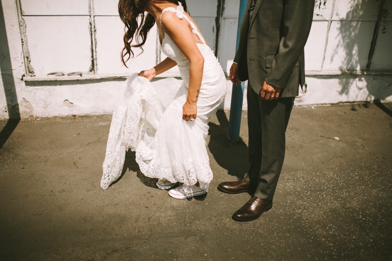 bride wearing converse shoes