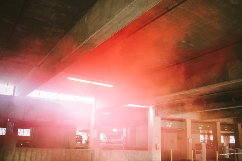 pink smoke in parking garage