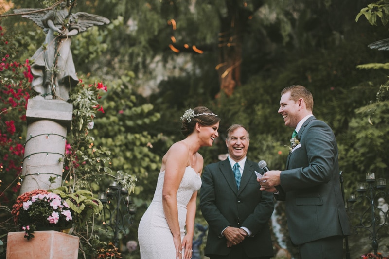 wedding ceremony surrounded by green plants
