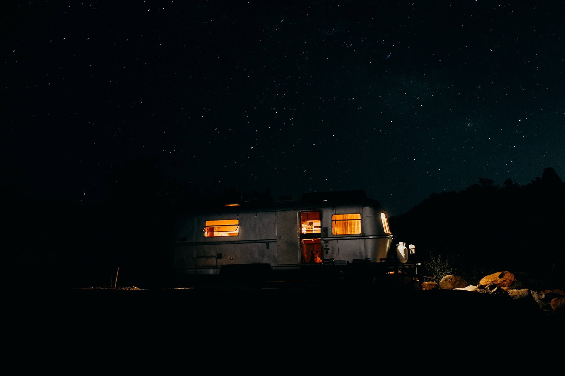 trailer at night with starry skies